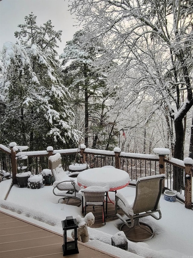 view of snow covered deck