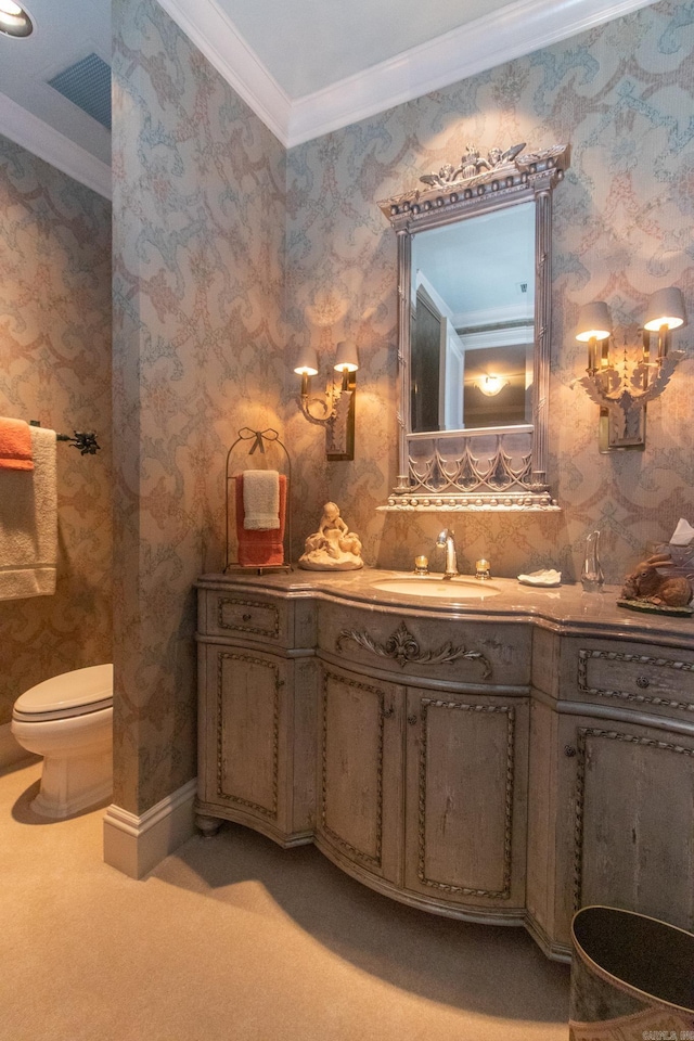 bathroom featuring wallpapered walls, visible vents, toilet, crown molding, and vanity