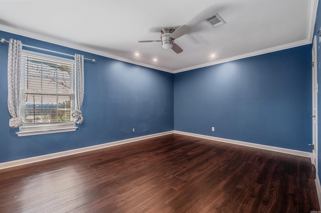 unfurnished room with ceiling fan, wood finished floors, visible vents, baseboards, and crown molding