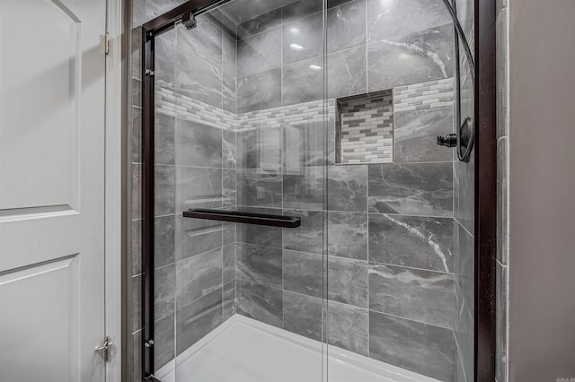 bathroom with a stall shower