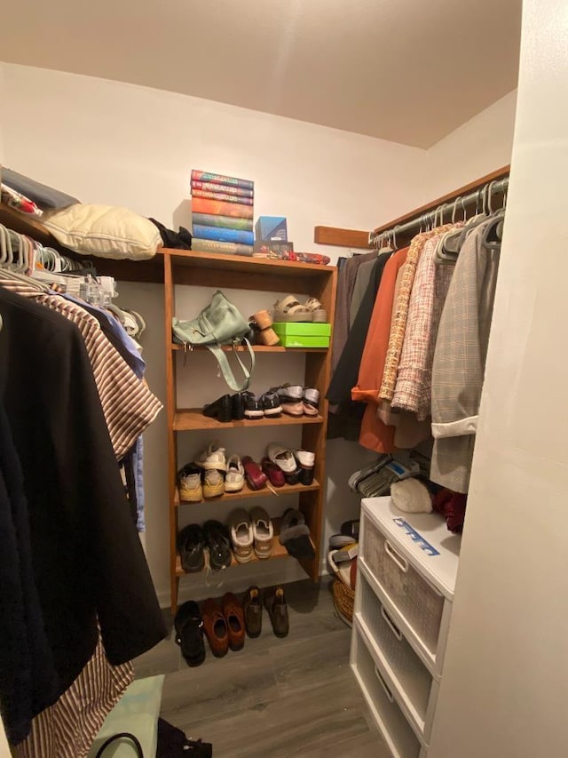 spacious closet featuring wood finished floors