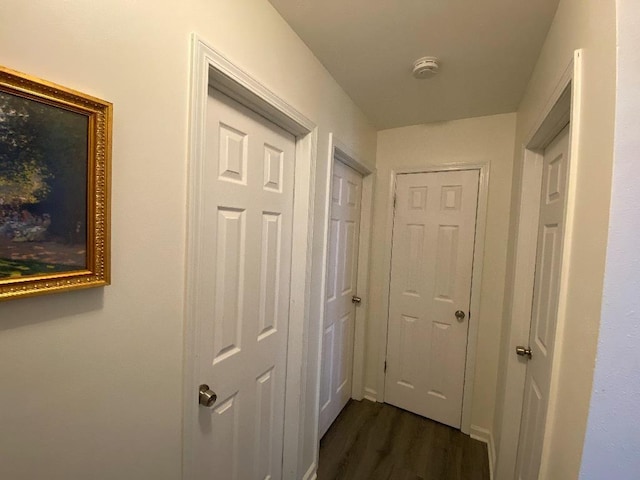 hall with dark wood finished floors