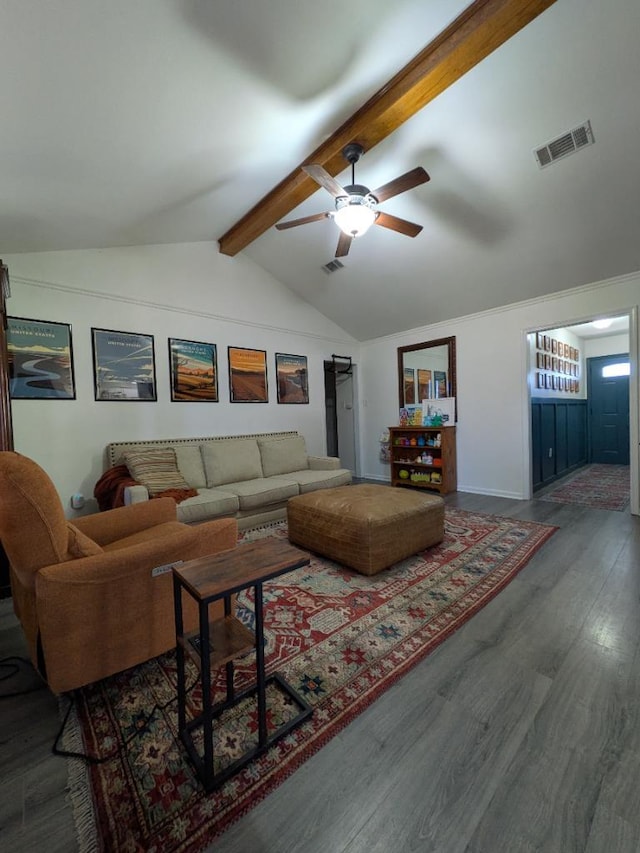 living area with vaulted ceiling with beams, ceiling fan, visible vents, and wood finished floors