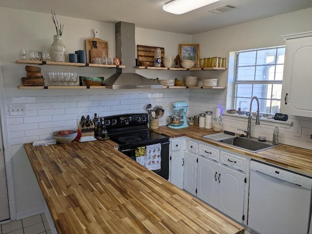 kitchen featuring open shelves, black / electric stove, white dishwasher, and a sink