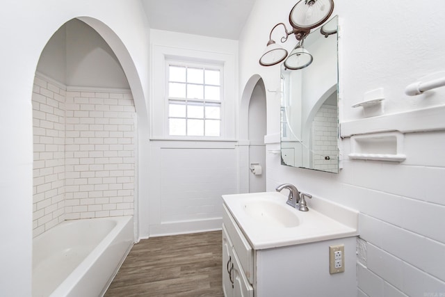 bathroom with vanity and wood finished floors