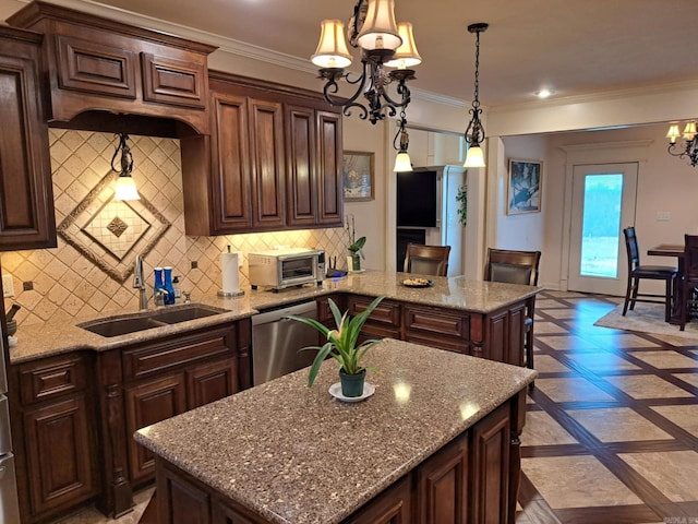 kitchen featuring a notable chandelier, a sink, ornamental molding, stainless steel dishwasher, and backsplash