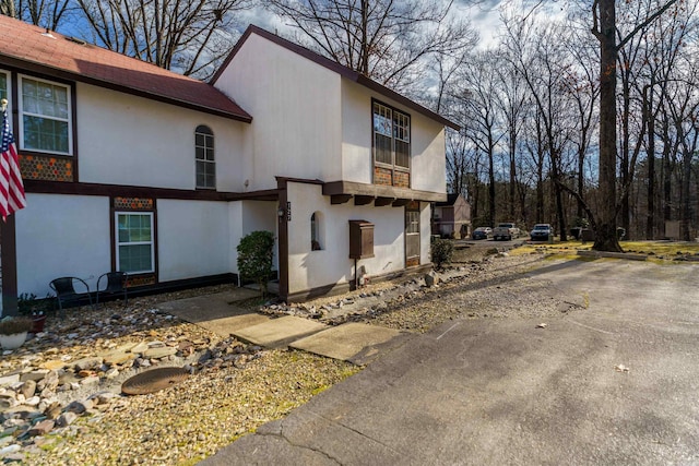127 Emperado Way, Hot Springs Village, AR 71909 - view of front of property featuring stucco siding and roof with shingles