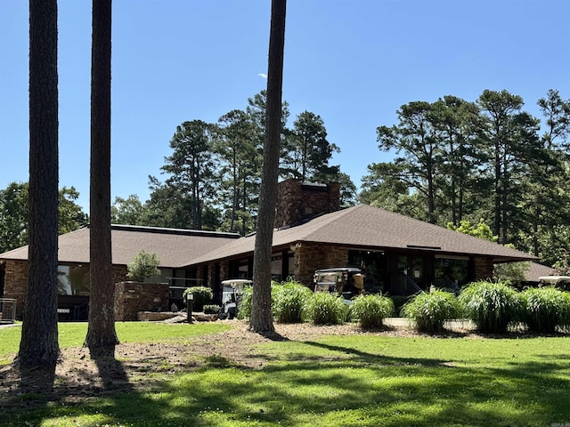 127 Emperado Way, Hot Springs Village, AR 71909 - ranch-style house featuring a front yard, a chimney, and stone siding