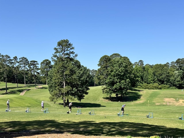 127 Emperado Way, Hot Springs Village, AR 71909 - surrounding community with a yard, view of golf course, and view of scattered trees