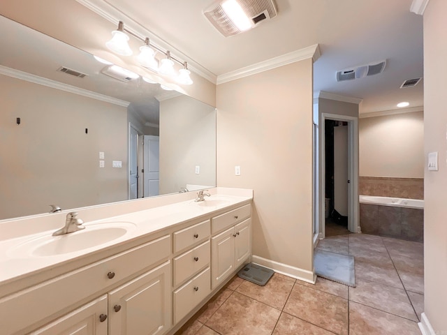 bathroom featuring visible vents, crown molding, and a sink