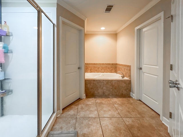 bathroom featuring tile patterned floors, visible vents, a shower stall, and crown molding