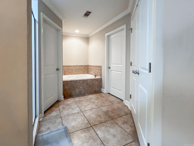 full bathroom featuring visible vents, a garden tub, crown molding, and tile patterned flooring