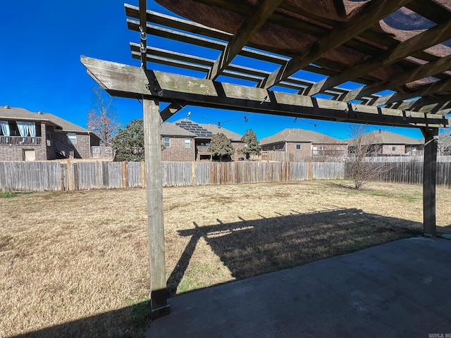 view of yard featuring a pergola, a patio, and fence