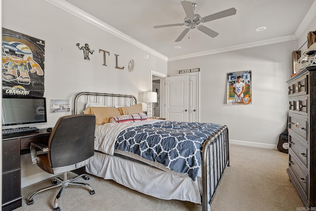 carpeted bedroom featuring ceiling fan, ornamental molding, and baseboards