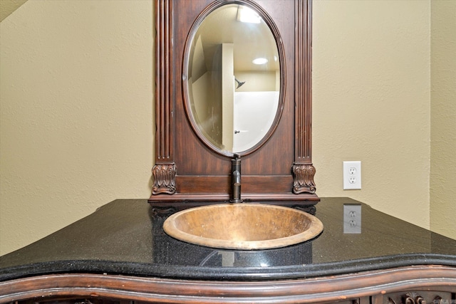 room details with a sink and a textured wall