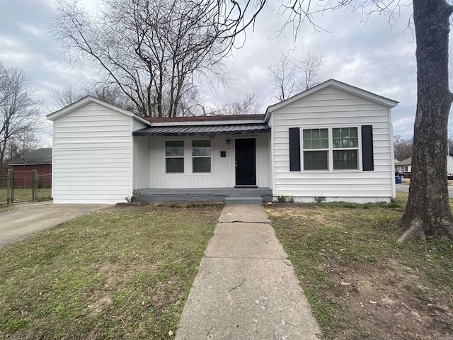 view of front of property with a porch and a front yard