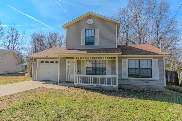 traditional-style house featuring covered porch, a garage, fence, driveway, and a front yard