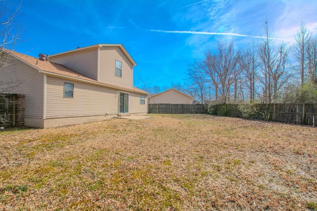 view of yard with a patio and a fenced backyard