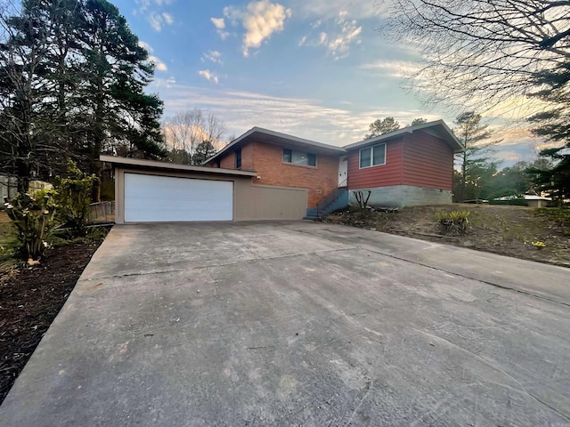 view of front of home featuring driveway and an attached garage