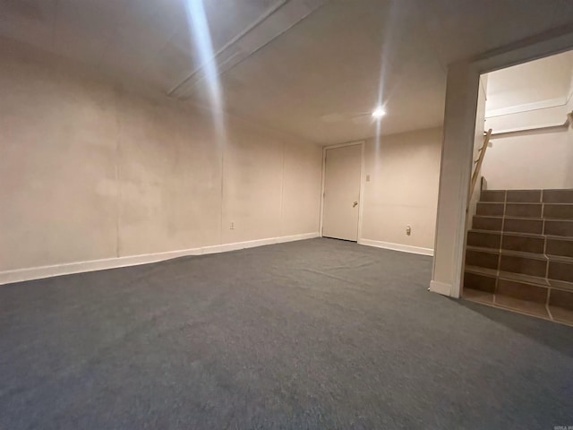 unfurnished room featuring baseboards