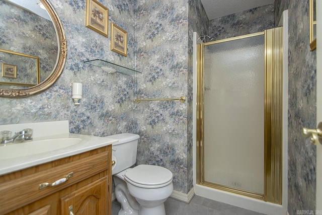 full bath featuring toilet, a shower stall, vanity, and wallpapered walls