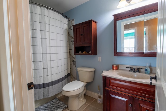 bathroom with tile patterned flooring, toilet, a shower with shower curtain, vanity, and baseboards