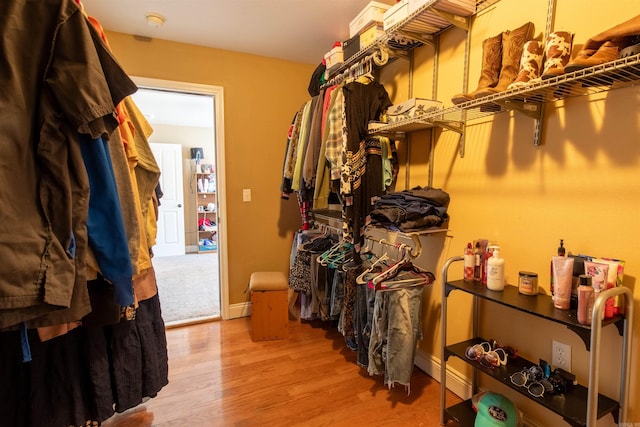 spacious closet with wood finished floors