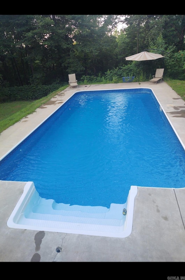 pool featuring a patio area