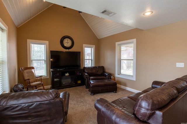 living room featuring lofted ceiling, carpet flooring, visible vents, and baseboards