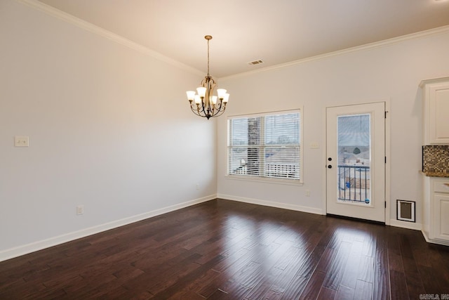 unfurnished dining area with baseboards, visible vents, ornamental molding, and dark wood-style flooring