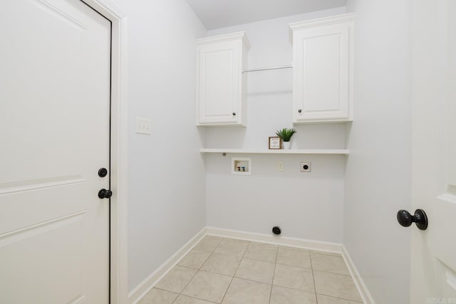 laundry area featuring cabinet space, baseboards, washer hookup, and hookup for an electric dryer