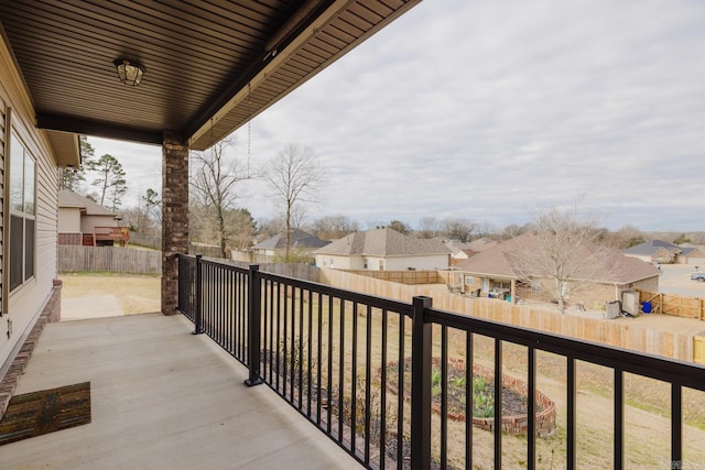 balcony featuring a patio area and a residential view