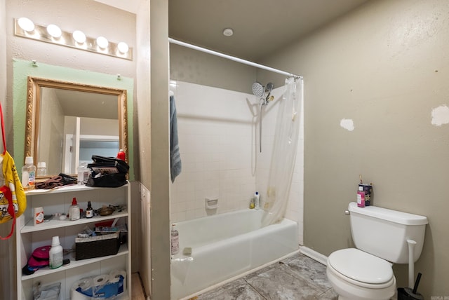 bathroom featuring shower / tub combo, tile patterned flooring, and toilet