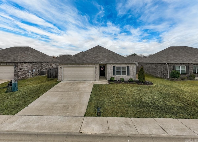 view of front of property featuring a garage, brick siding, a shingled roof, driveway, and a front yard