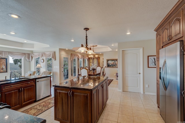 kitchen with stainless steel appliances, recessed lighting, a sink, and light tile patterned floors