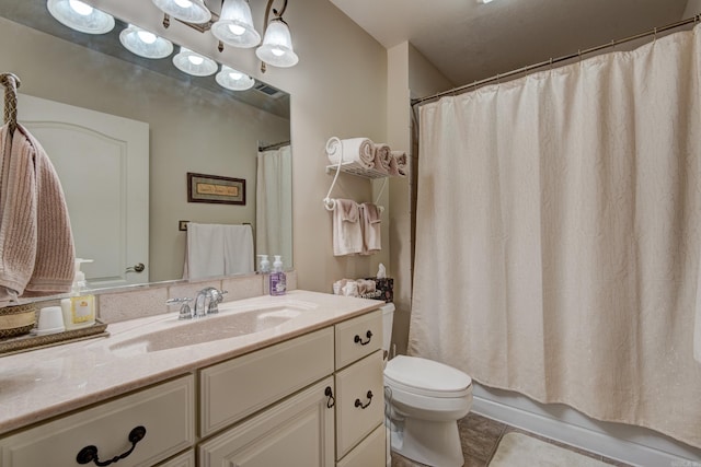 bathroom with visible vents, toilet, tile patterned floors, shower / bath combination with curtain, and vanity