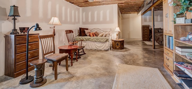 living area featuring concrete flooring