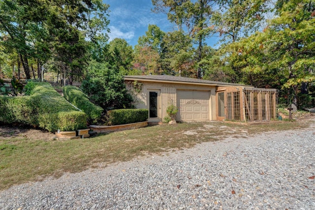 garage featuring driveway