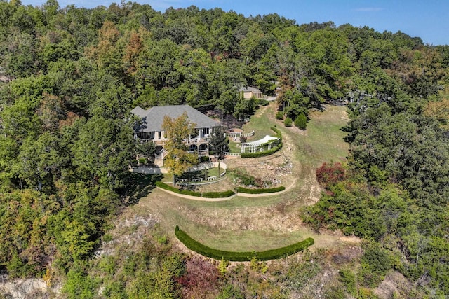 bird's eye view featuring a view of trees