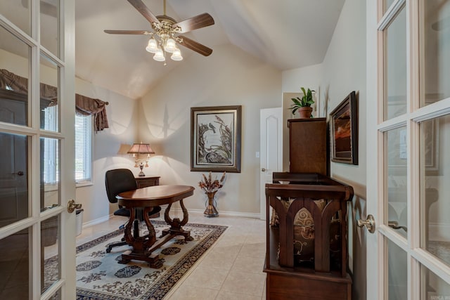 sitting room with french doors, lofted ceiling, a ceiling fan, tile patterned flooring, and baseboards