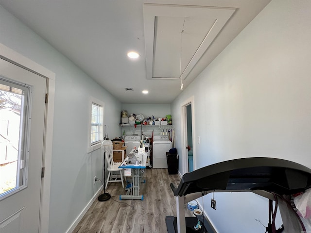 interior space with recessed lighting, wood finished floors, visible vents, baseboards, and attic access