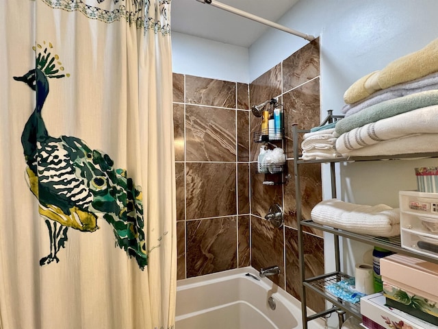 bathroom with shower / tub combo with curtain