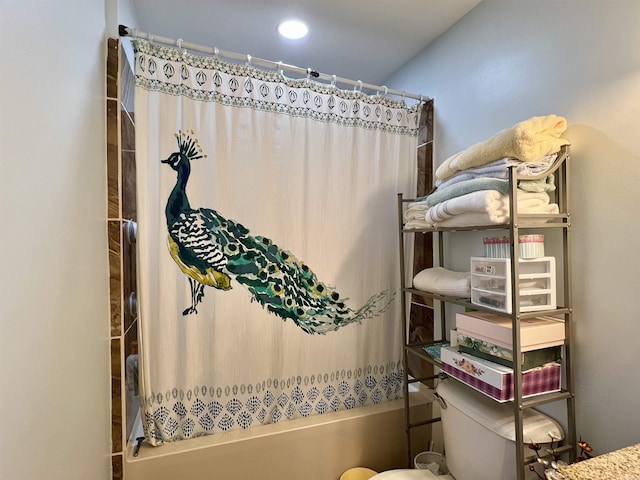 full bath featuring toilet and shower / bathtub combination with curtain