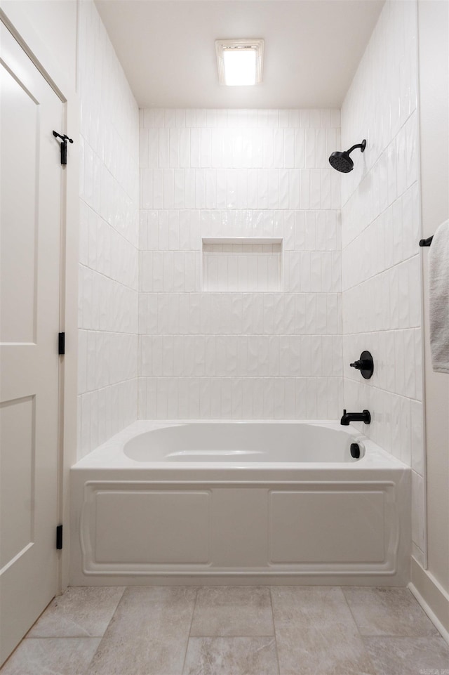 bathroom featuring shower / bath combination and tile patterned floors