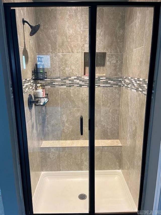 bathroom with a stall shower