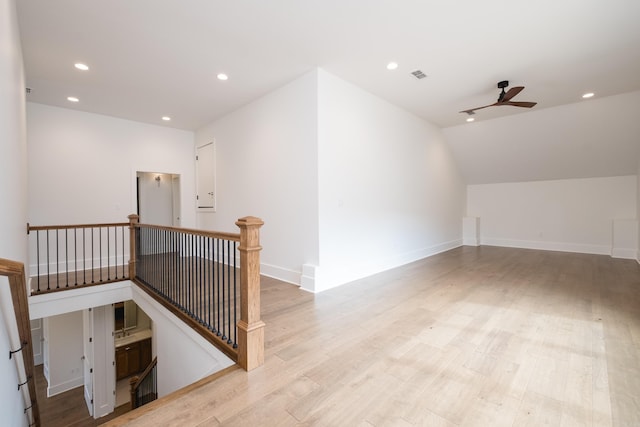 additional living space with recessed lighting, visible vents, ceiling fan, wood finished floors, and baseboards