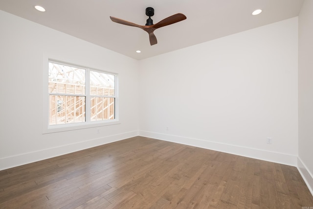 unfurnished room featuring dark wood-type flooring, recessed lighting, baseboards, and a ceiling fan