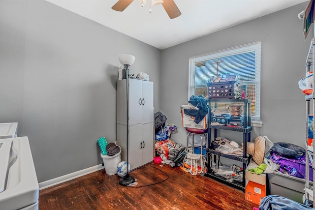 game room with washer / clothes dryer, ceiling fan, baseboards, and wood finished floors