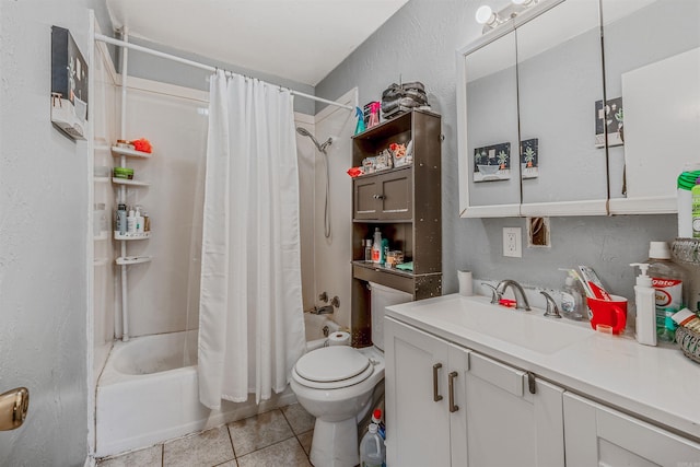 full bath with shower / bath combination with curtain, a textured wall, toilet, vanity, and tile patterned flooring