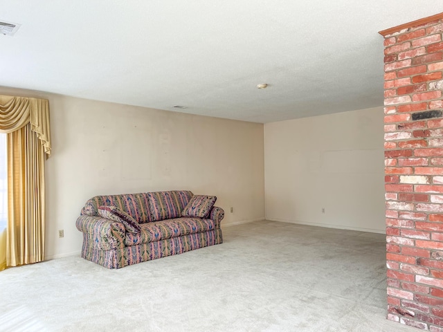 sitting room with carpet floors and visible vents